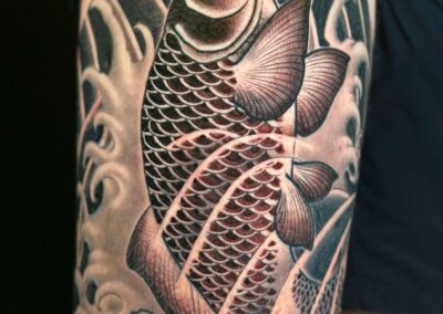 japanese traditional tattoo of koi in water