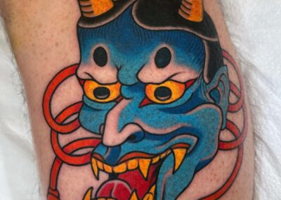 Japanese Traditional tattoo of blue hannya mask