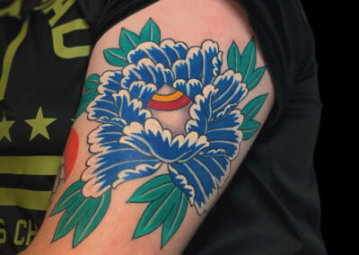 Japanese Traditional tattoo of a blue peony