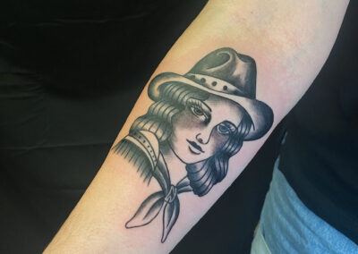 American traditional cowgirl tattoo