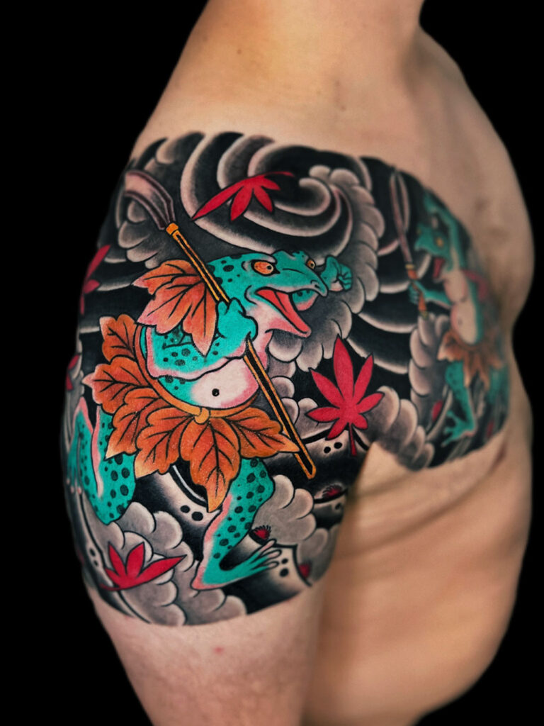 Japanese Traditional tattoo of frogs or "Kaeru" symbolize
