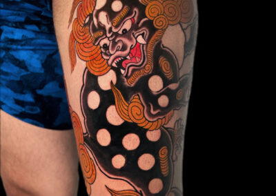 Japanese Traditional tattoo of a fudog on the leg