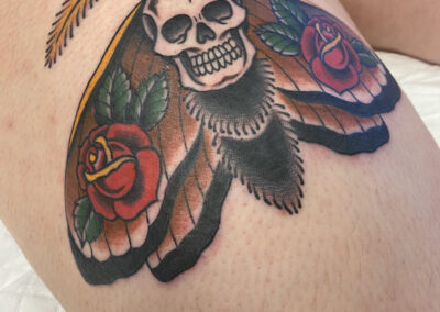 American traditional moth with skull and roses