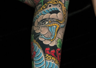 Japanese traditional open mouth snake in yellow and blue full leg sleeve
