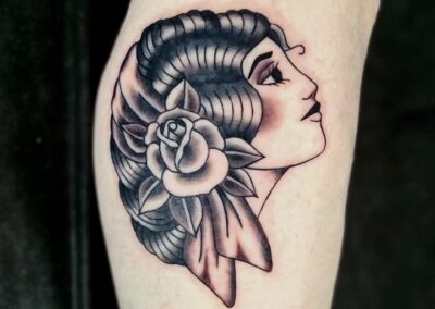 american traditional girl head tattoo
