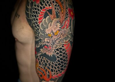 Japanese traditional tattoo black dragon with red belly tattoo