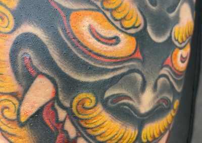 Japanese traditional foo dog face tattoo