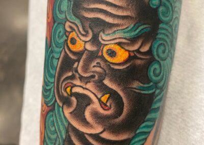 Japanese traditional Fudo with blue hair tattoo