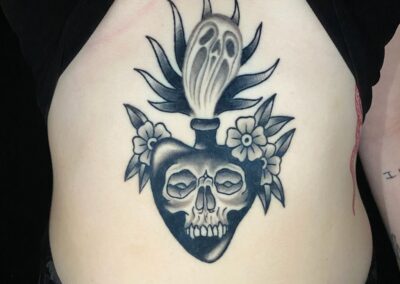 American traditional black and gray sacred art with skull and ghost tattoo