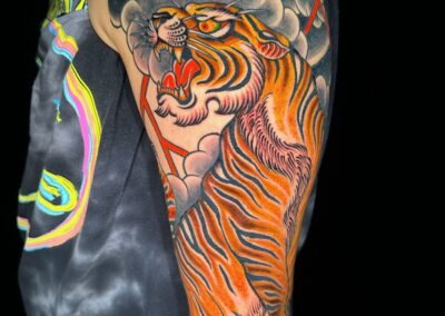 Japanese traditional open mouth, full body tiger with clouds and wind bards tattoo