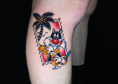 tweety bird and Sylvester the cat post card tattoo