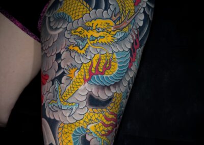 Japanese traditional yellow dragon with blue belly full leg sleeve tattoo
